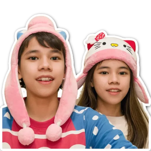 A boy and girl wearing Hello Kitty hats.