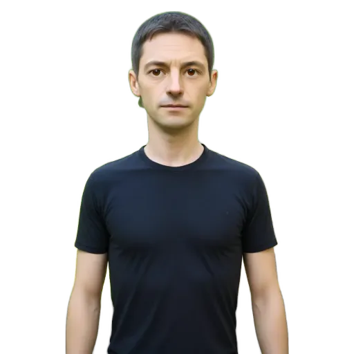 A man wearing a black shirt is standing in front of a black background.