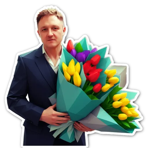A man in a suit holding a bunch of colorful tulips.