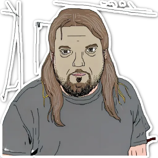 A man with a beard and long hair is sitting down.
