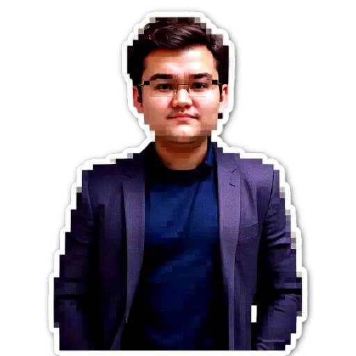 A young man wearing a purple shirt and a dark purple jacket stands in front of a black background.