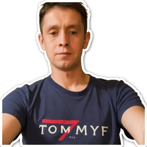 A man with a sticker on his shirt that says Tommy myfk.