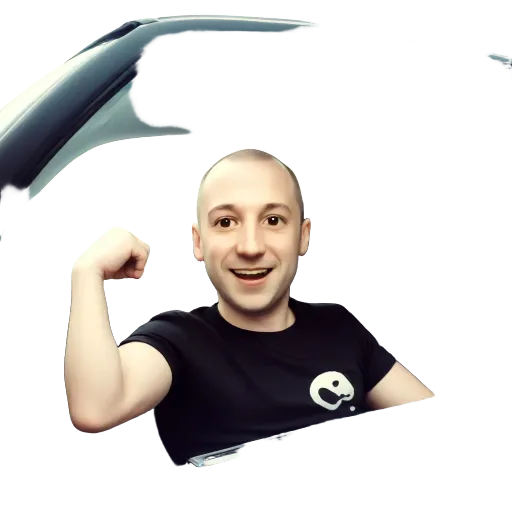 A man with a mouse over his mouse is smiling and pumping his fist.