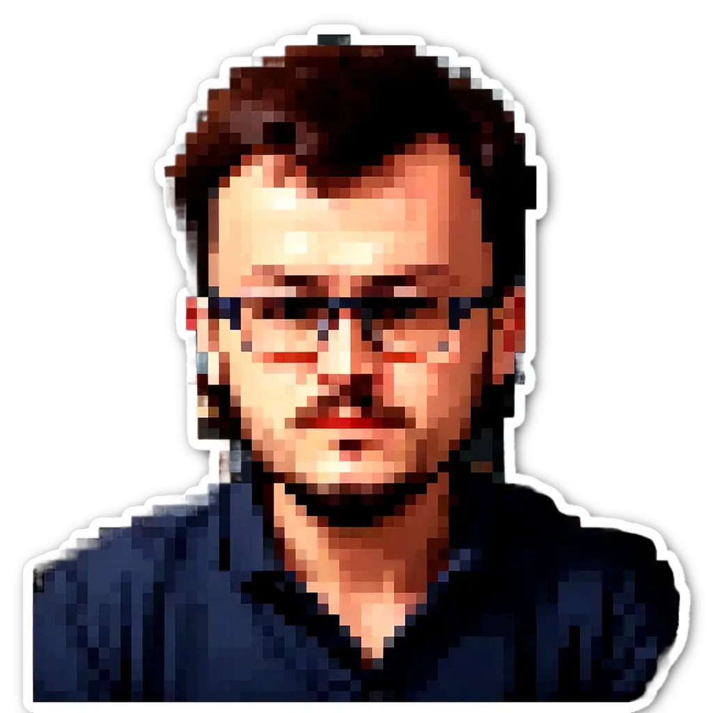 A man wearing glasses and a blue shirt.