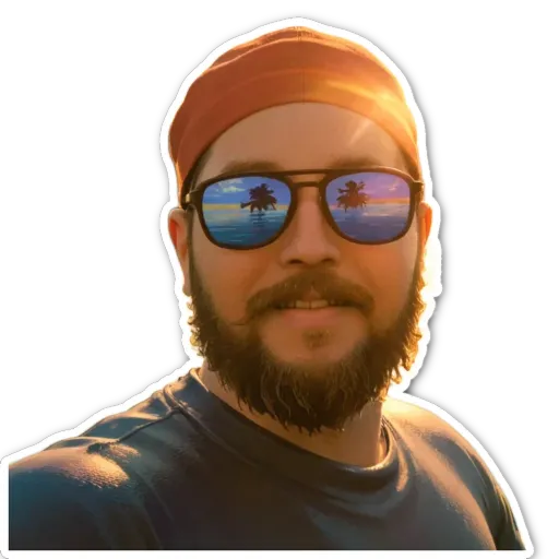 A man wearing glasses and a red bandana.