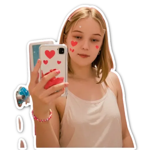 A girl is holding up her phone and taking a picture.
