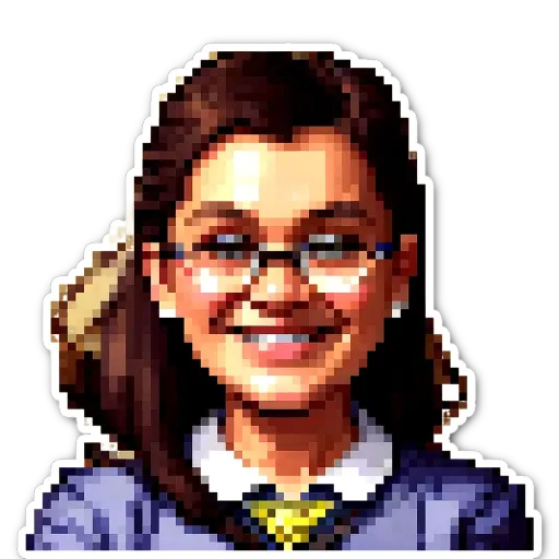 A girl wearing glasses is smiling at the camera.