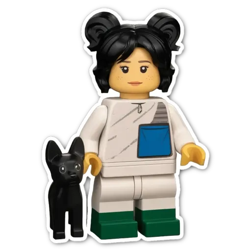 A lego person holding a black dog.