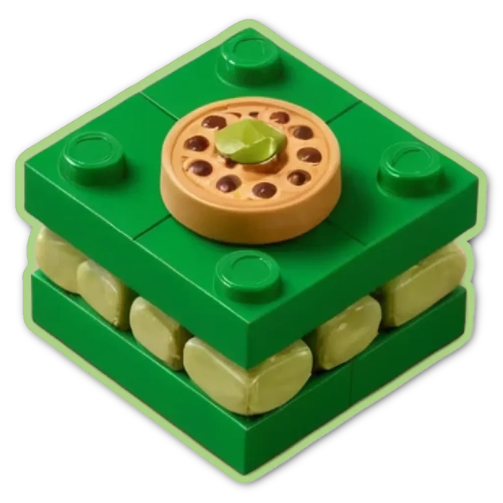 A green lego box with a food item on top.