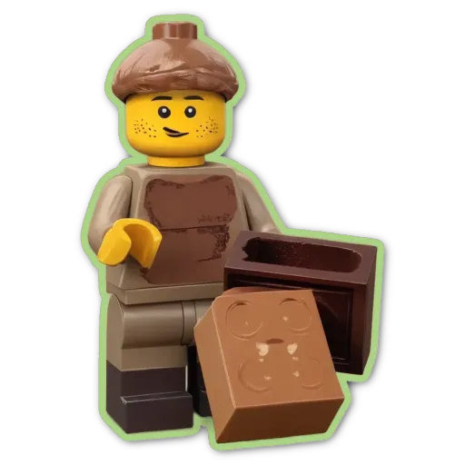A plastic lego person holding a chocolate bar and a box.