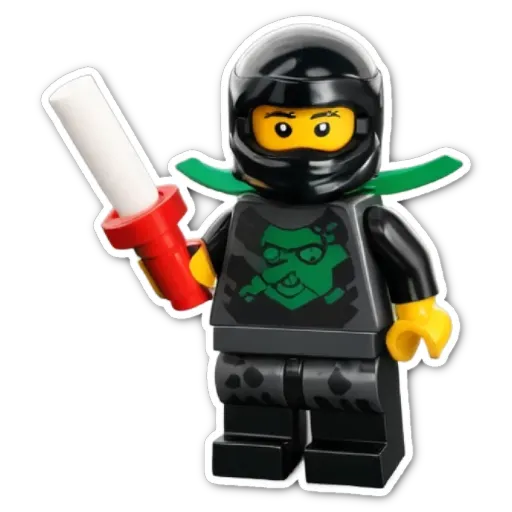 A child playing with a black lego that has a sword and a skull on it.