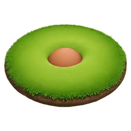 A green donut hole in a field of grass.