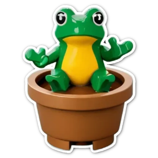 A lego frog sitting on a plant pot.