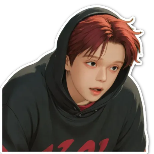 A boy with red hair and a black hoodie.