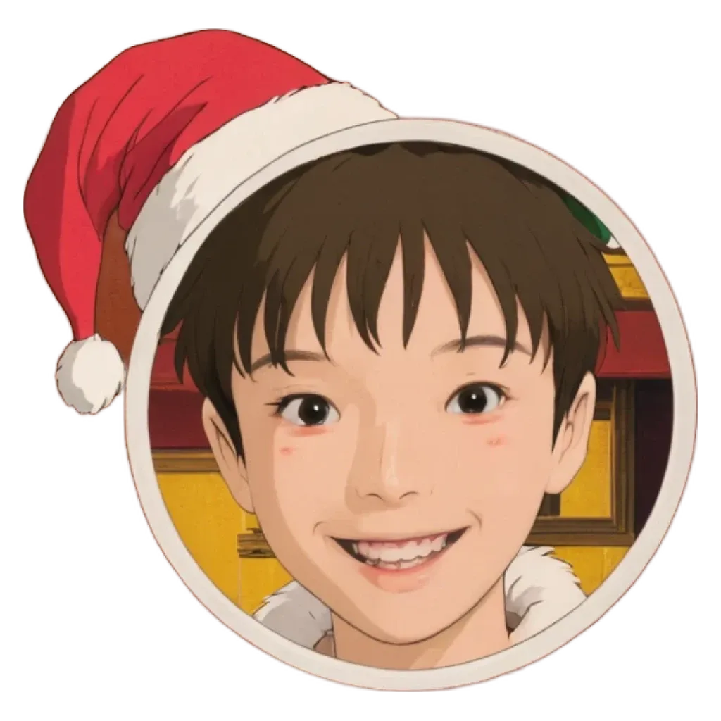 A boy wearing a santa hat his smiling.